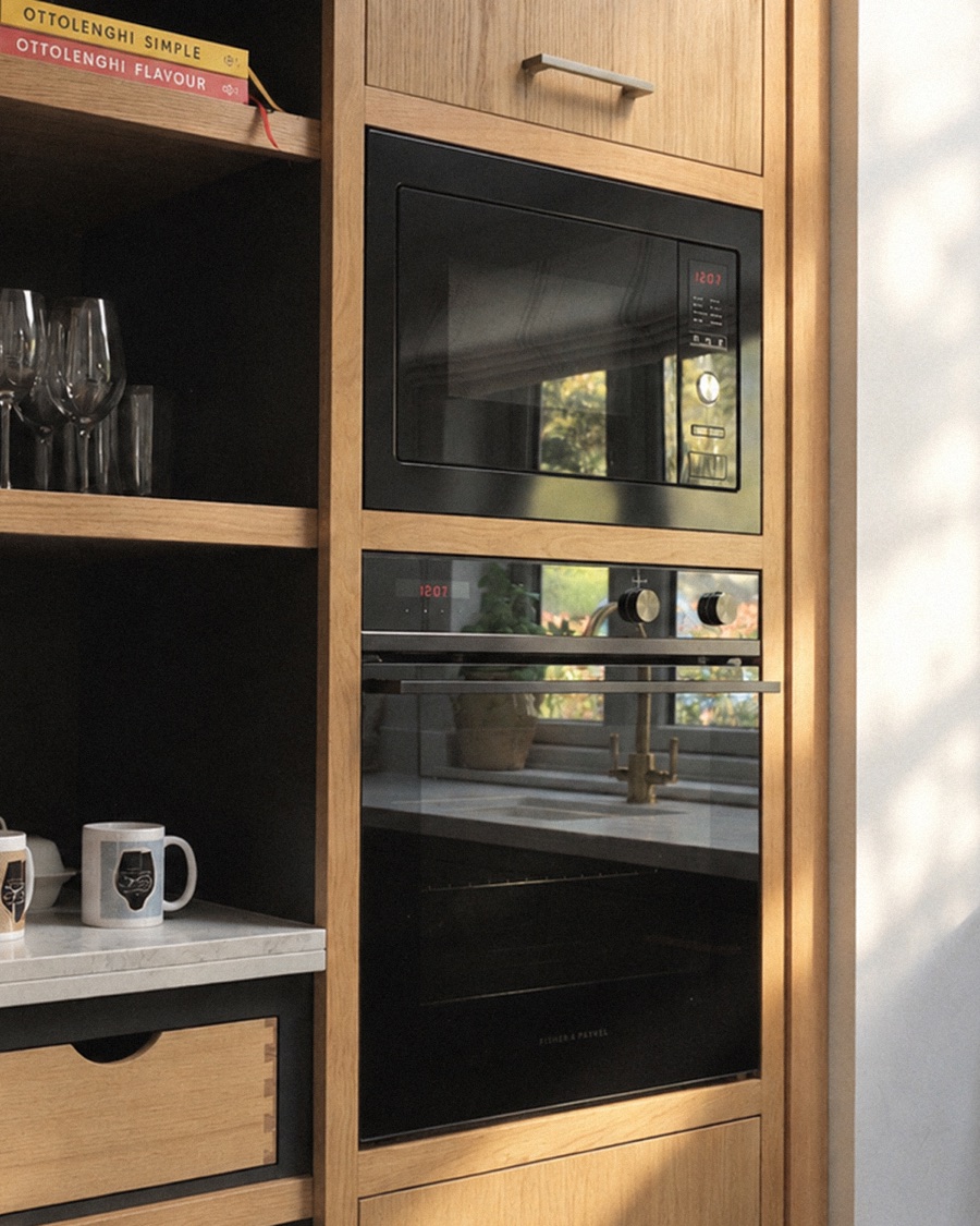 Bespoke oak kitchen cabinetry with built-in appliances
