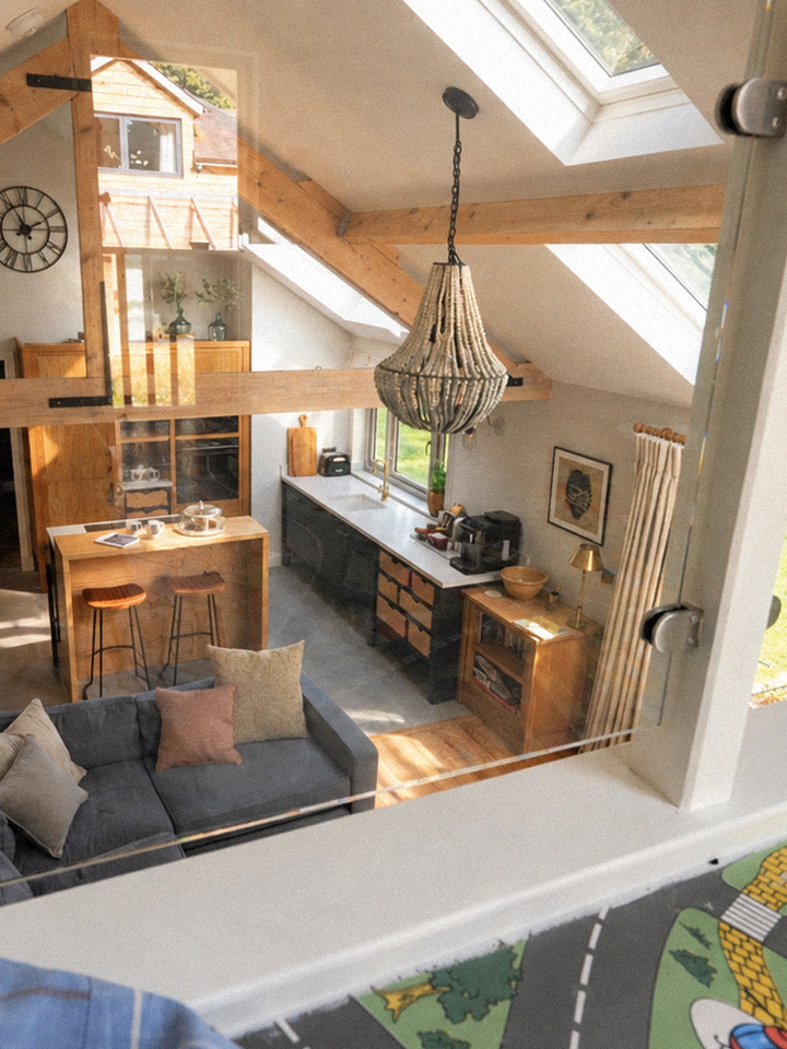 The workshop seen from the upstairs playroom, with its original road-pattern floor